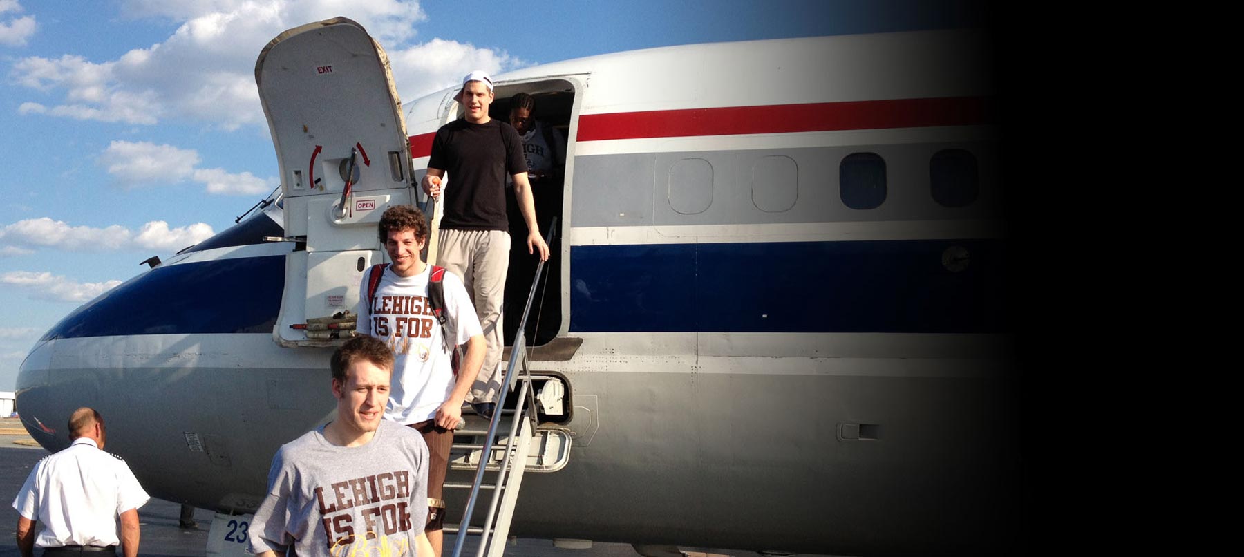Lehigh University basketball players getting off plane