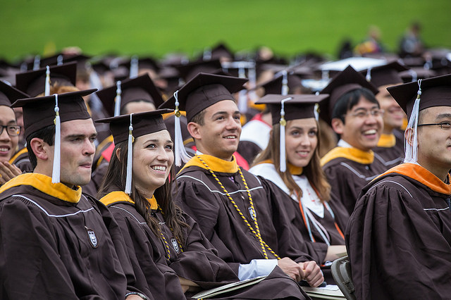 Graduates listening to speakers