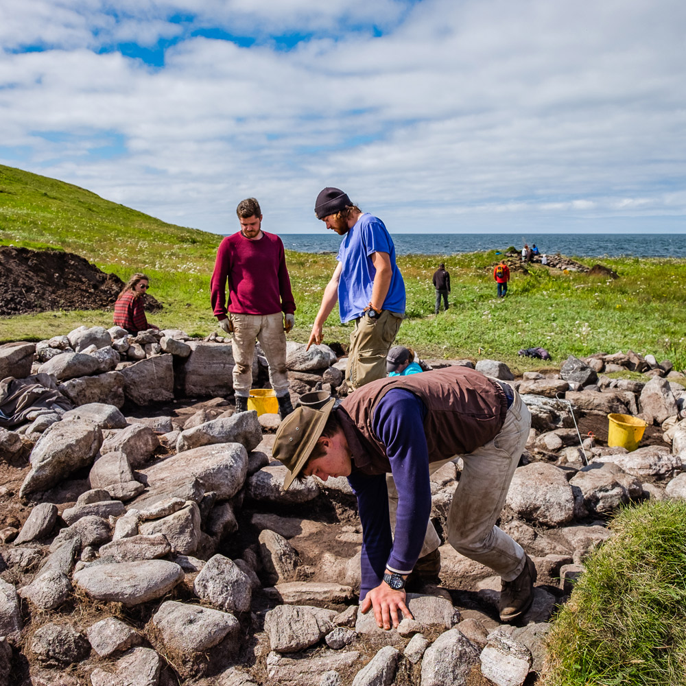 Students in Scotland examining rocks