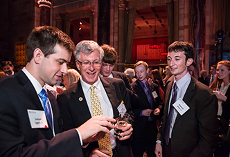 President Simon at an event with alumni