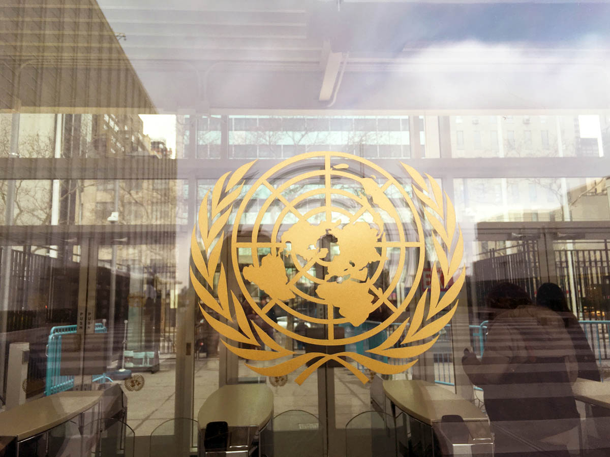 United Nations logo on a window