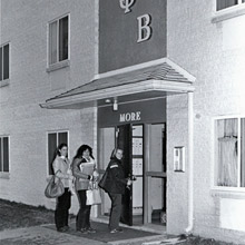 Female students entering the building for the Gamma Phi Beta sorority